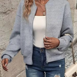 Bomberjack met geometrisch patroon en ronde hals