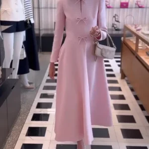 Arial | Effen kleur elegante jurk met strikken