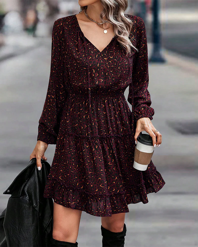 Jurk met V-hals en bedrukte A-lijn - Afbeelding 2