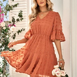 Lotte | Oranje jurk met stippen