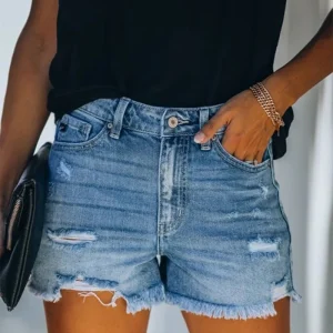 Mid-rise gescheurde denim shorts